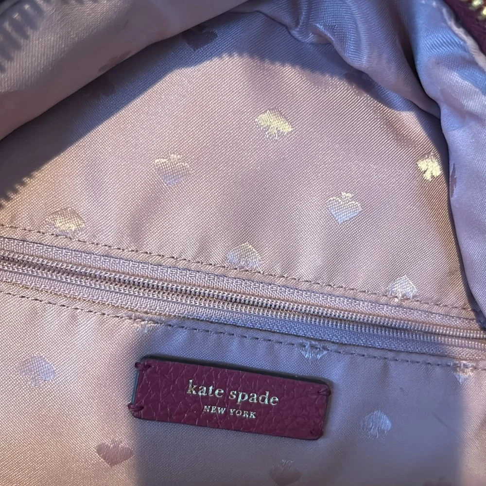Kate, spade wine colored back pack in pebbled grain leather Beautiful lining